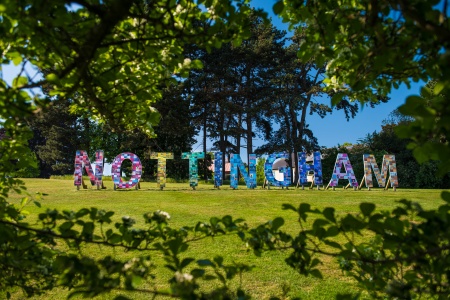 Image of the University of Nottingham sign in the grounds of the University of Nottingham